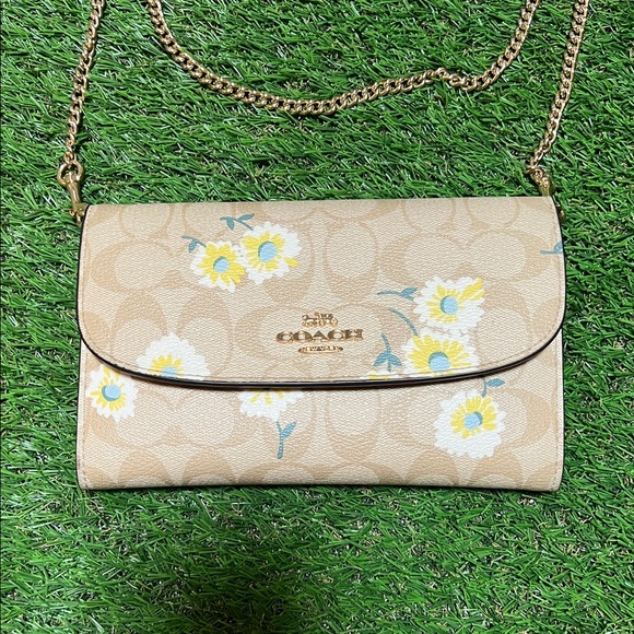 Coach Handbags - Coach Gemma Crossbody bag in Signature Canvas with a Daisy print